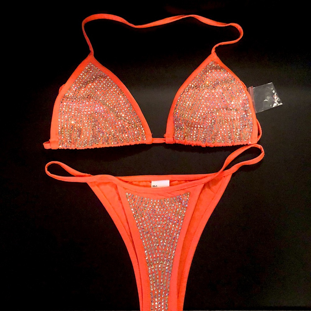 Custom made coral bikini with Swarovski crystals. Brand new, never worn. Size M.